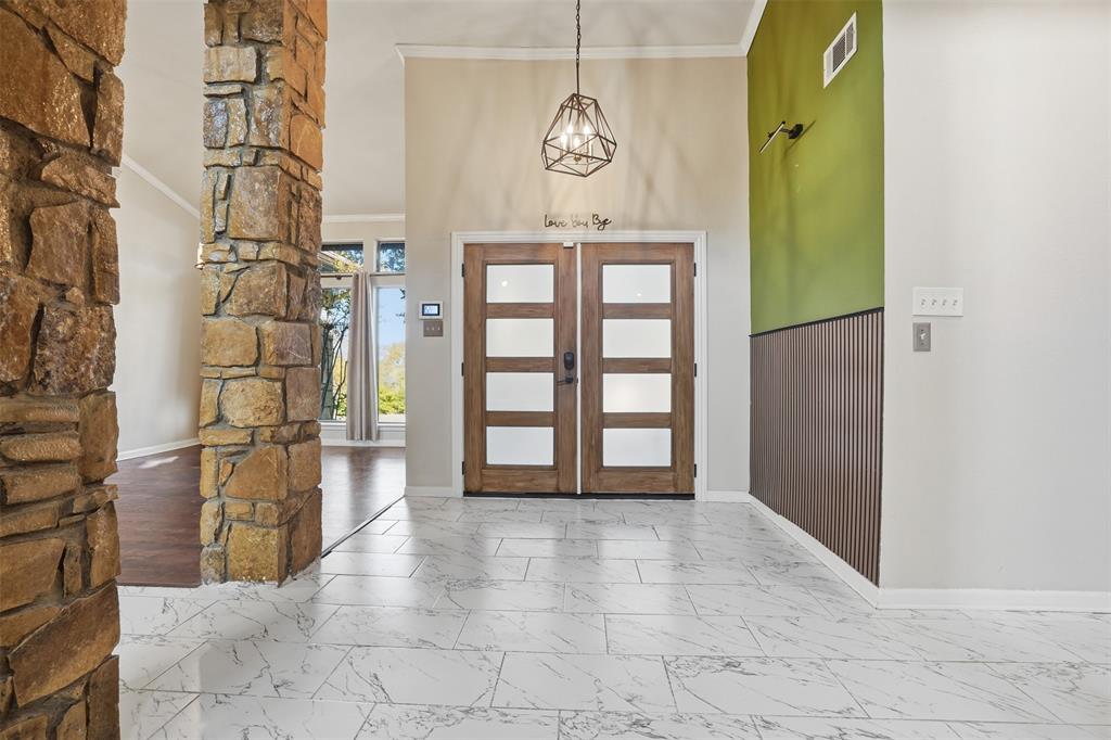 704 Timberview Court North Fort Worth, TX 76112 - Photo 5 of 40 a view of entryway with a front door