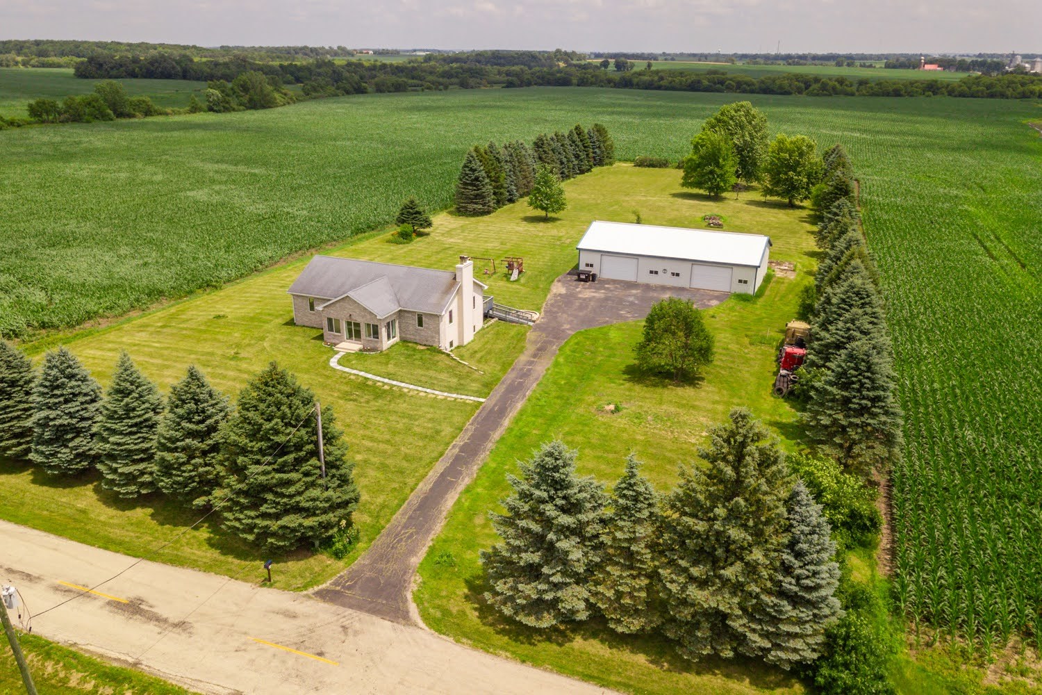 16649 Beaverton Road Capron, IL 61012 - Photo 43 of 48 a view of a lake with a big yard
