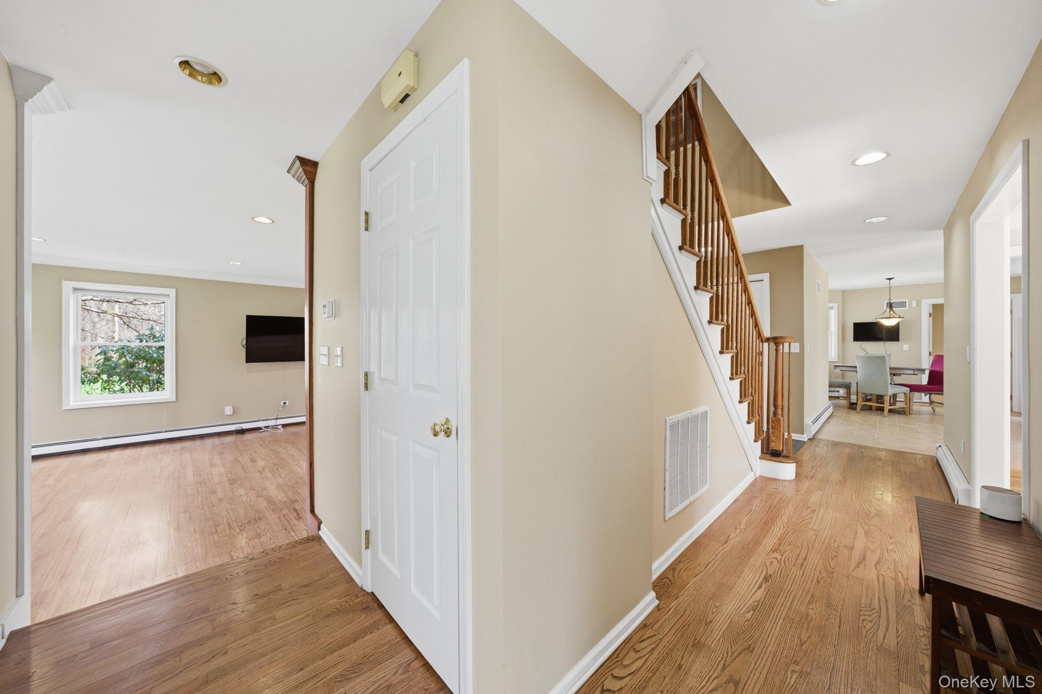 83 Onderdonk Road Warwick, NY 10990 - Photo 14 of 40 a view of a hallway with wooden floor and staircase