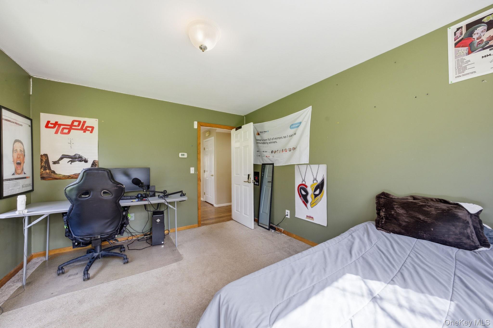 83 Onderdonk Road Warwick, NY 10990 - Photo 15 of 40 a bedroom with a bed and a desk