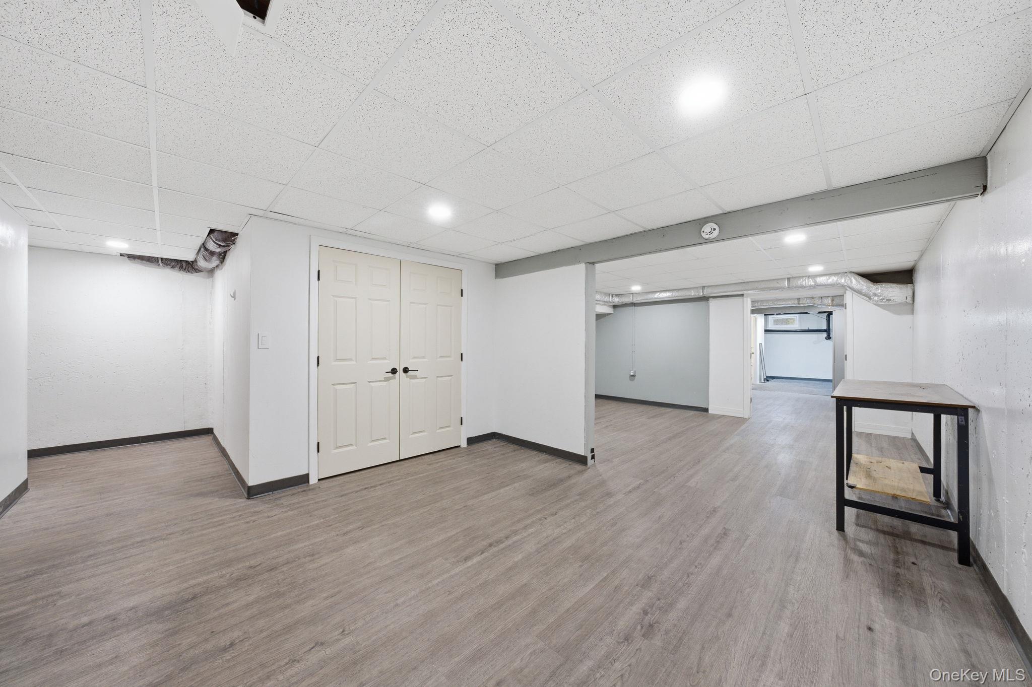 83 Onderdonk Road Warwick, NY 10990 - Photo 31 of 40 a view of an empty room with wooden floor and a window