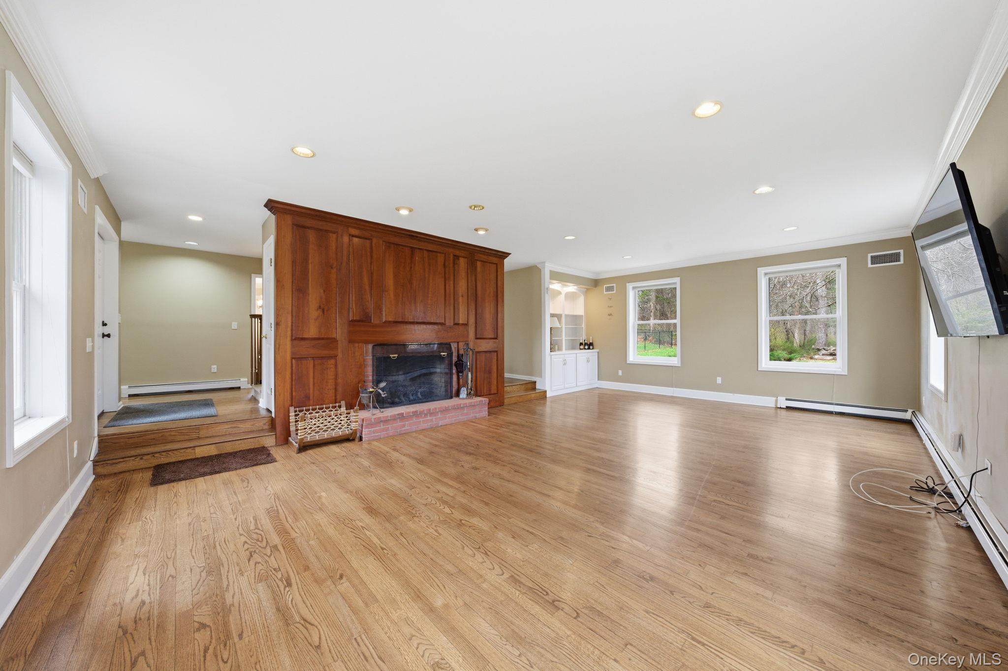 83 Onderdonk Road Warwick, NY 10990 - Photo 10 of 40 a view of a livingroom with wooden floor and furniture