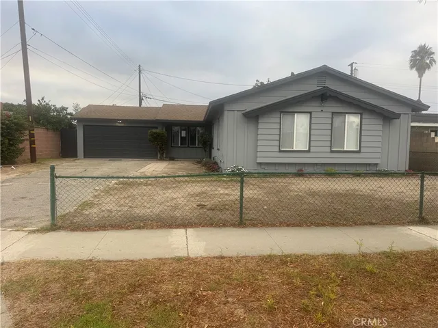 a kitchen with granite countertop a stove and a sink