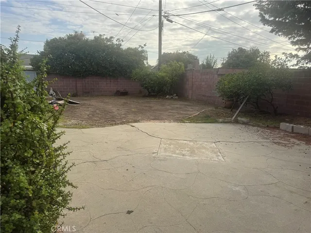 an empty room with a empty space and a window