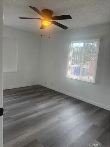 a view of empty room with a window