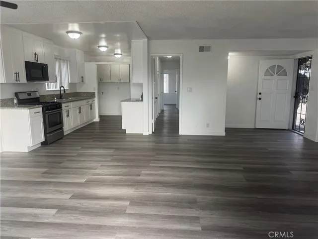 a bathroom with a toilet and a sink