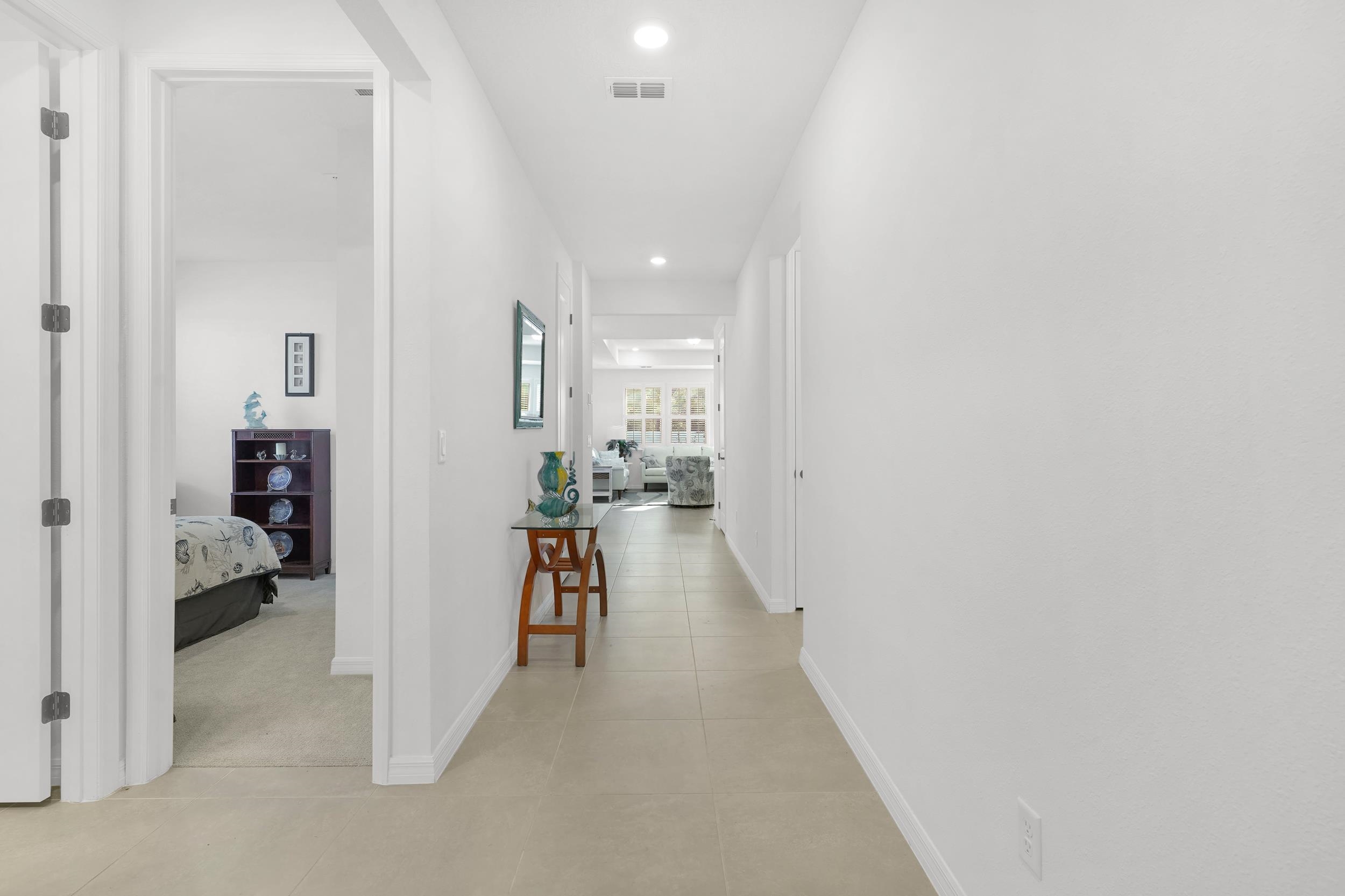 127 Shell Crk Court St. Augustine, FL 32086 - Photo 13 of 37 a view of hallway with livingroom and furniture