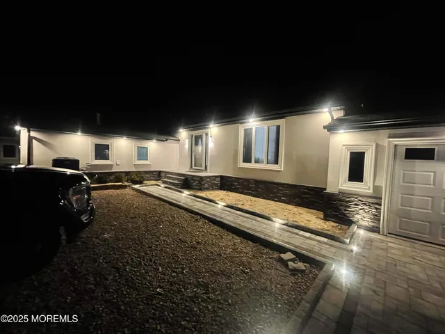 a view of swimming pool with outdoor seating