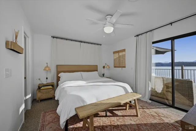 a view of a balcony with furniture