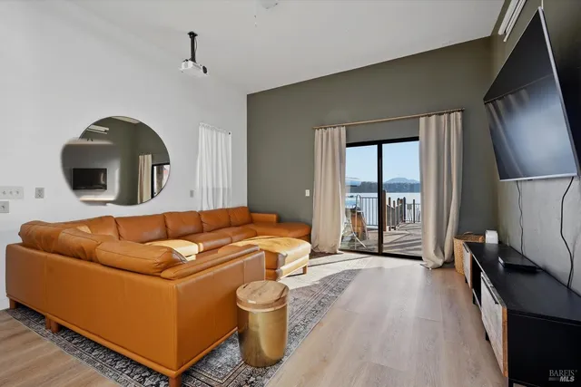 an aerial view of a house with a mountain view