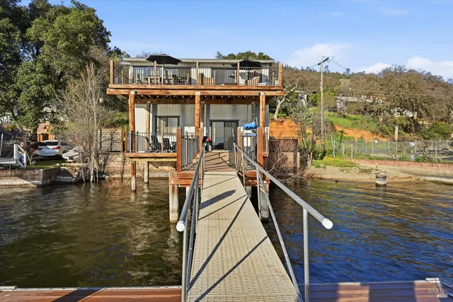 a view of a chairs and table on the terrace
