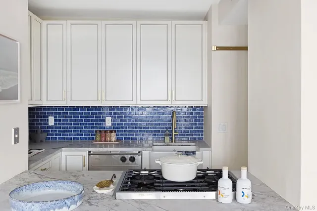 a bathroom with a toilet a sink and a shower