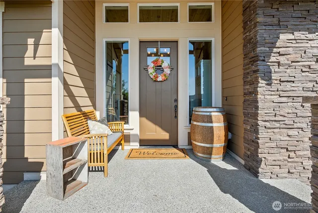 a view of a patio with table and chairs and potted plants