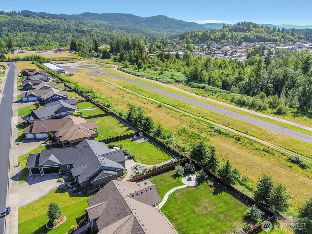 a view of a city with a lake