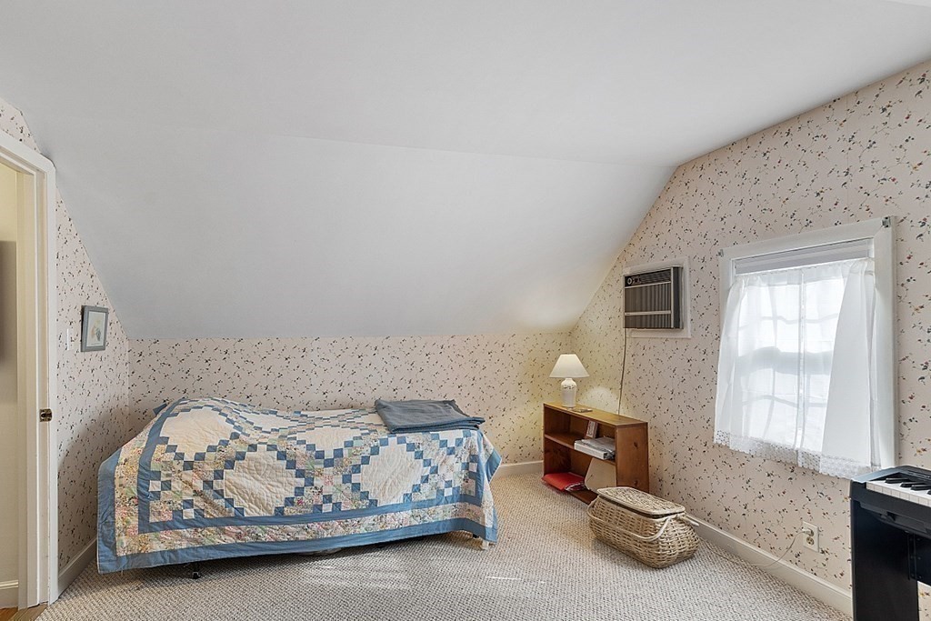 86 Locke Road Chelmsford, MA 01824 - Photo 33 of 41 a bedroom with a bed and window