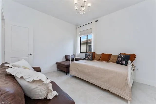 a bathroom with a toilet sink and shower