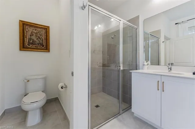 a bathroom with a bathtub and shower curtain