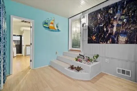 a bath room with a sink and a mirror