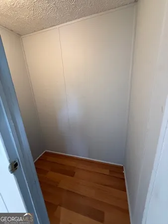 a view of small space with racks on the wall