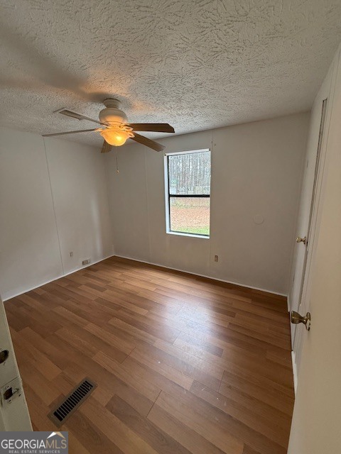 2791 Old Mill Road Rutledge, GA 30663 - Photo 20 of 26 wooden floor in an empty room