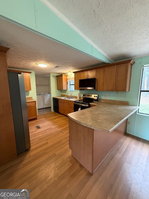 2791 Old Mill Road Rutledge, GA 30663 - Photo 6 of 26 a kitchen with stainless steel appliances granite countertop a refrigerator a stove top oven a sink and dishwasher