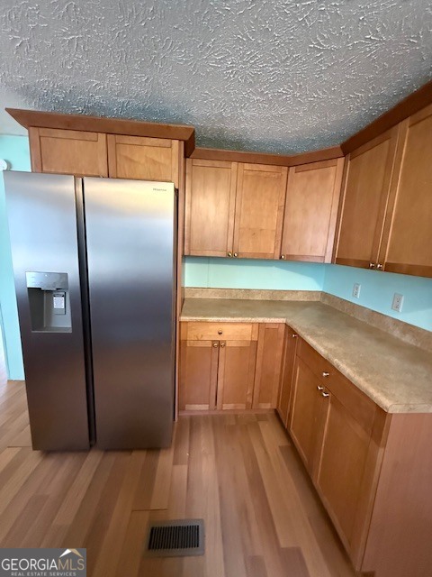 2791 Old Mill Road Rutledge, GA 30663 - Photo 7 of 26 a kitchen with a sink a refrigerator freezer and a stove