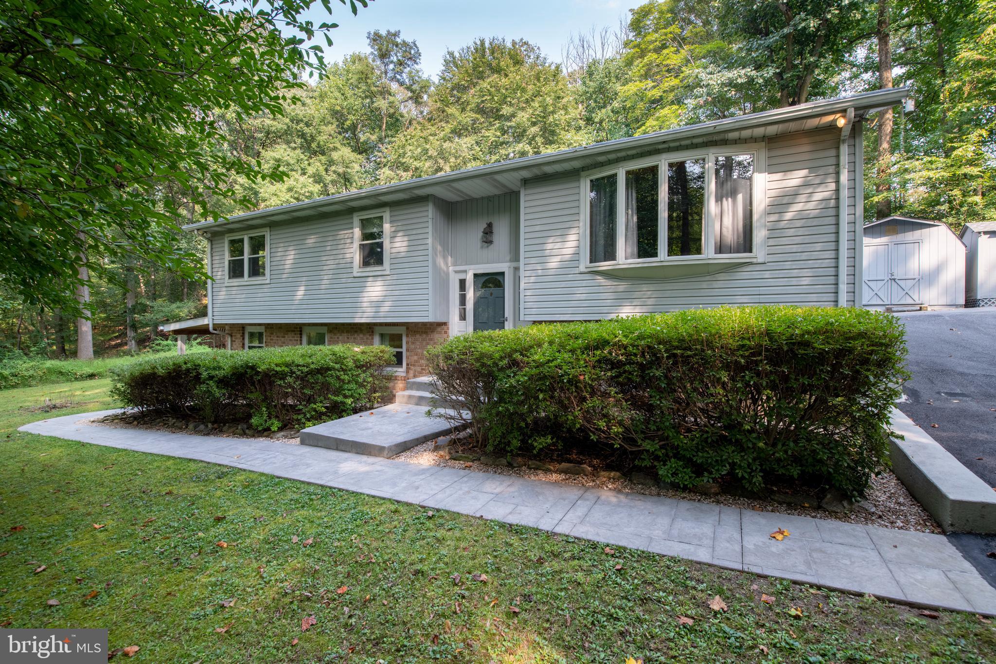 2514 Cub Hill Road Baltimore, MD 21234 - Photo 1 of 63 Stamped Concrete walkway and porch