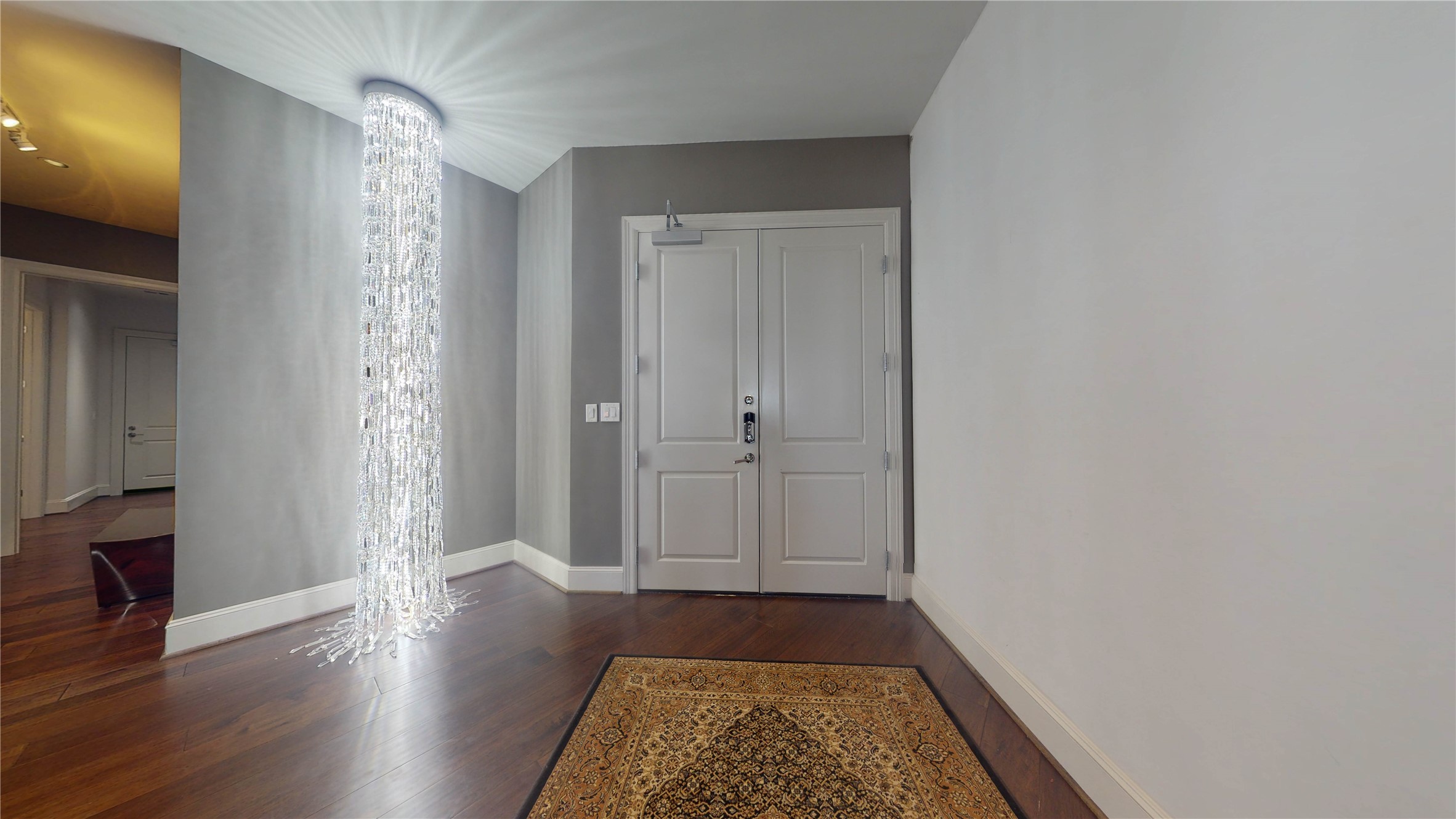 1409 Post Oak Boulevard, Unit 902 Houston, TX 77056 - Photo 22 of 38 a view of room with window and wooden floor