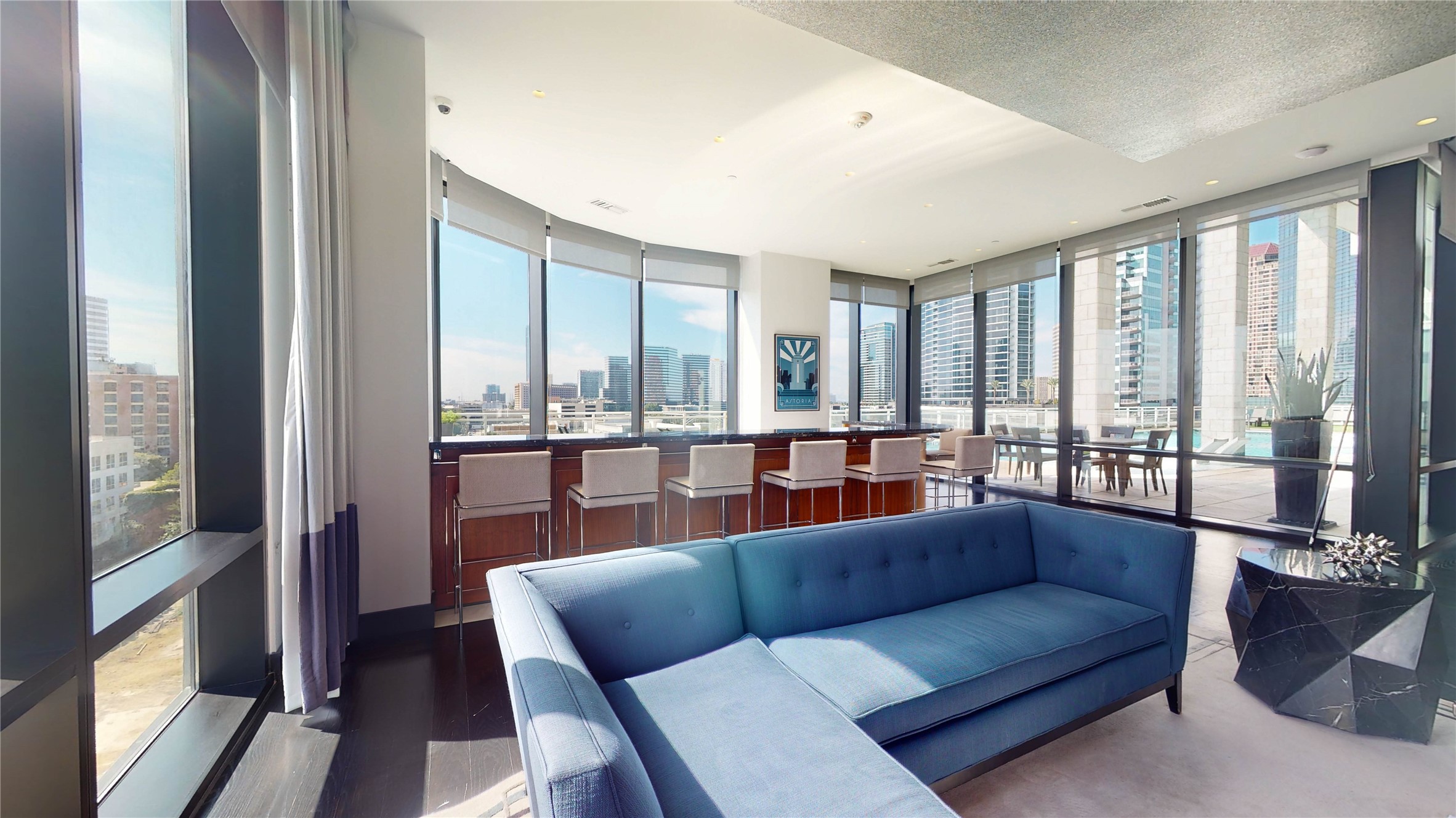 1409 Post Oak Boulevard, Unit 902 Houston, TX 77056 - Photo 29 of 38 a living room with furniture and floor to ceiling windows