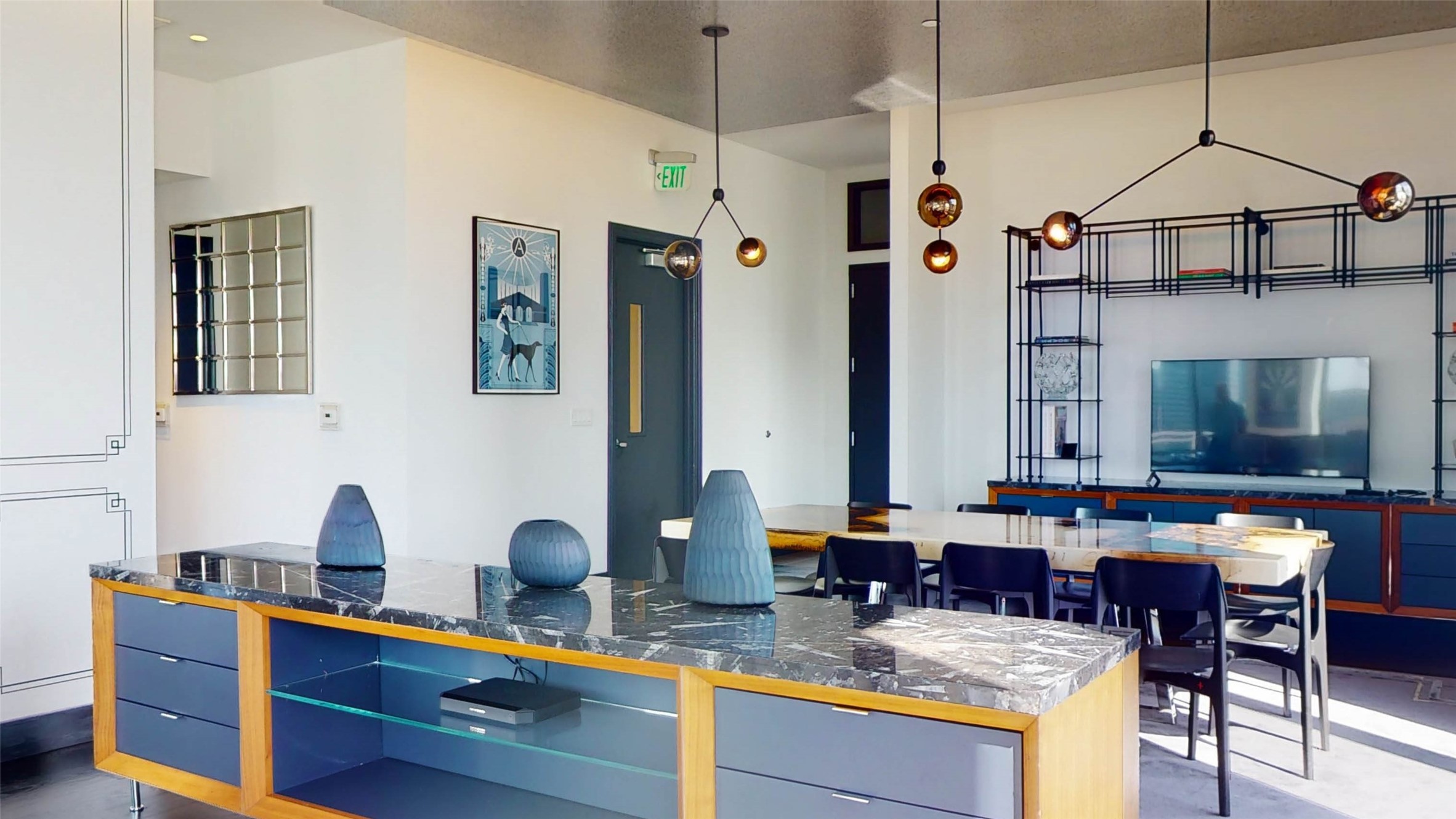 1409 Post Oak Boulevard, Unit 902 Houston, TX 77056 - Photo 30 of 38 a kitchen with granite countertop a sink a stove and chairs