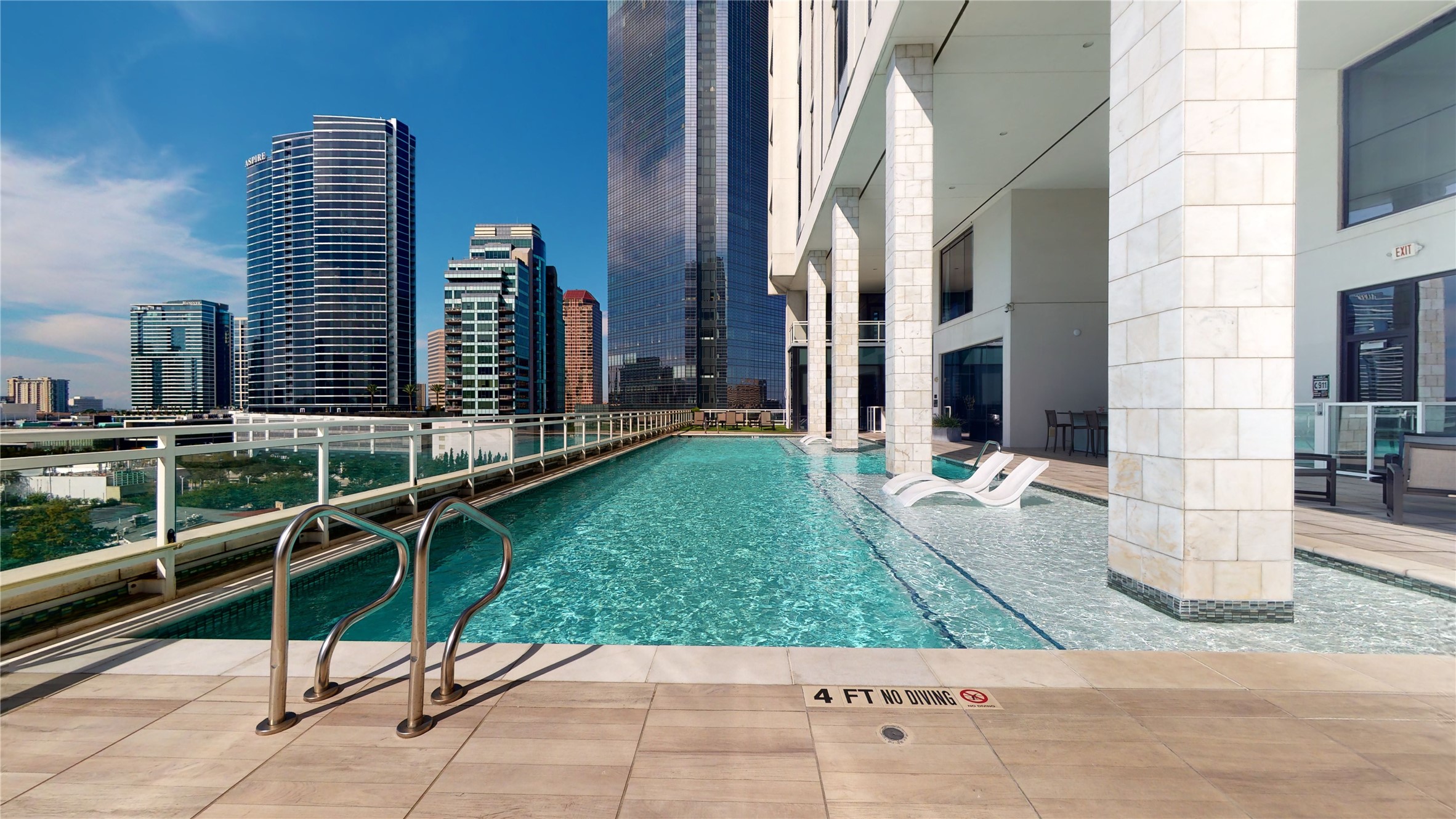 1409 Post Oak Boulevard, Unit 902 Houston, TX 77056 - Photo 36 of 38 a view of a building with a yard