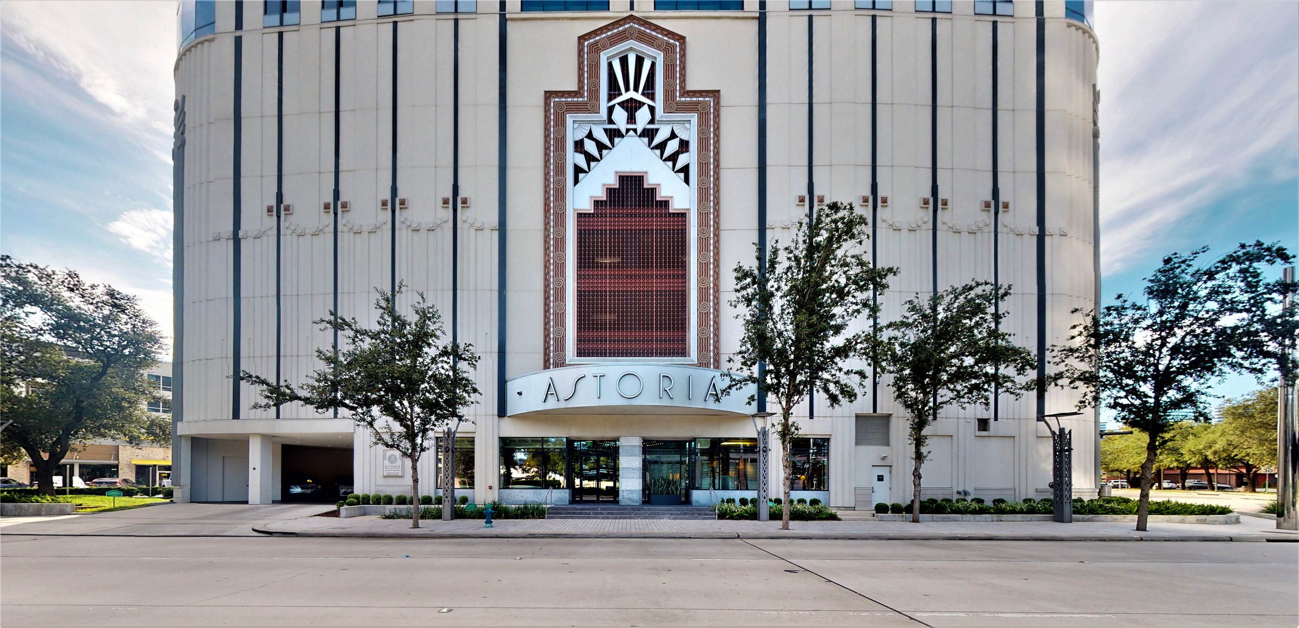 1409 Post Oak Boulevard, Unit 902 Houston, TX 77056 - Photo 37 of 38 a front view of a building with street sign