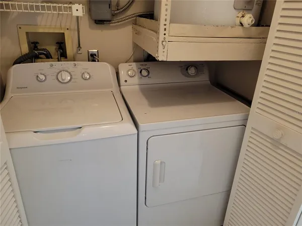 a utility room with dryer and washer