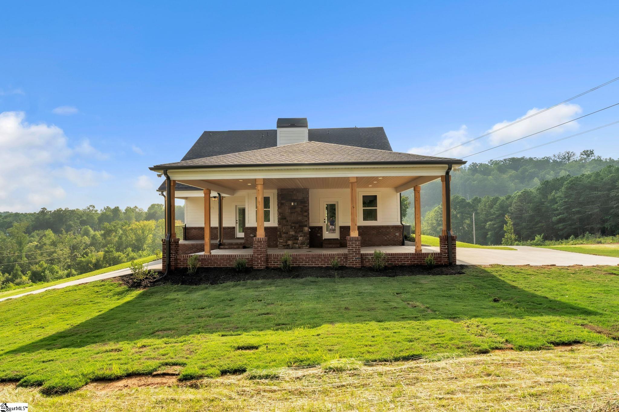 452 North Glassy Mountain Road Landrum, SC 29356 - Photo 14 of 46 brick knee wall, cedar columns, knotty pine ceiling