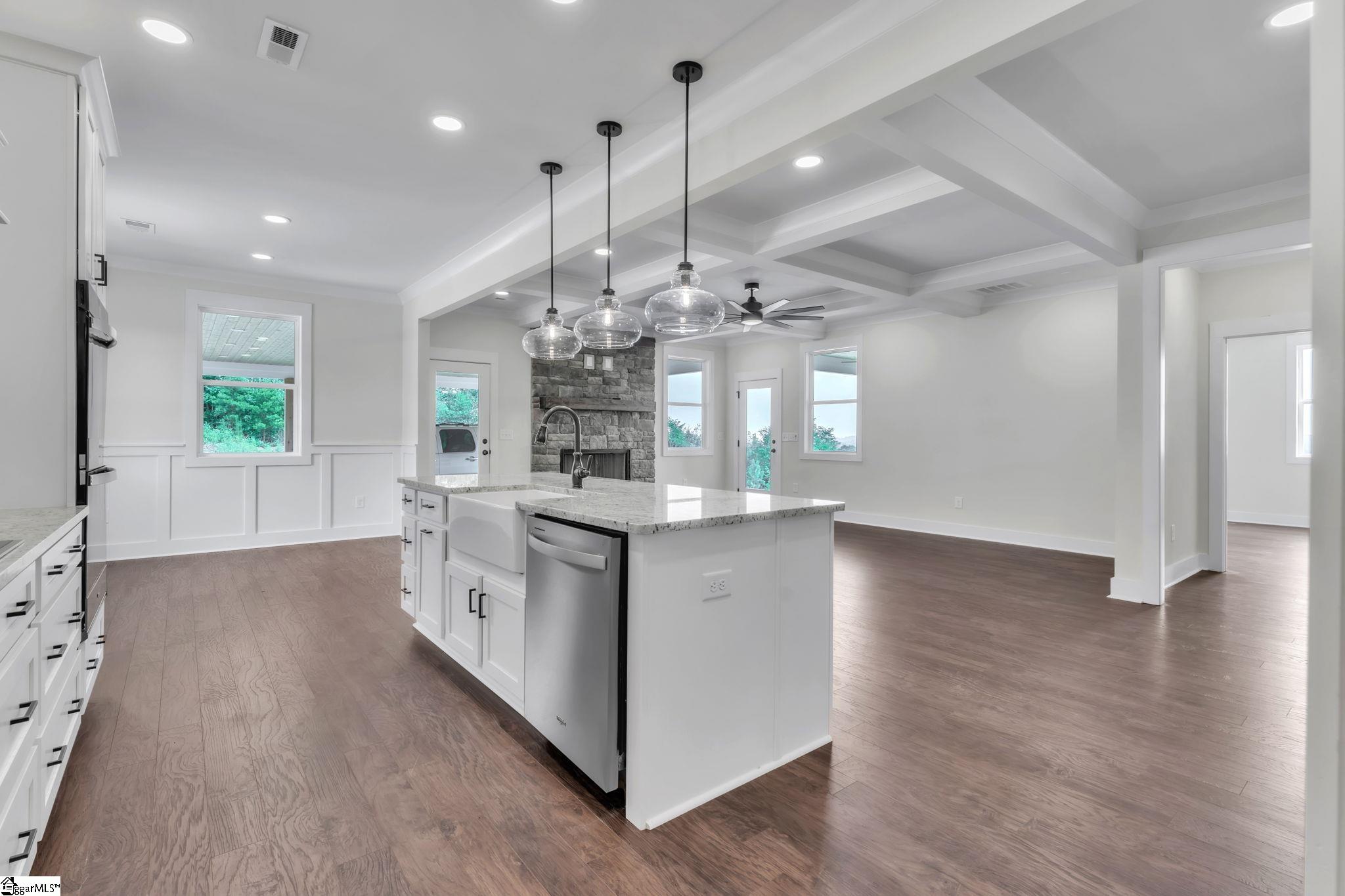 452 North Glassy Mountain Road Landrum, SC 29356 - Photo 25 of 46 sink in island, coffer, stone fireplace