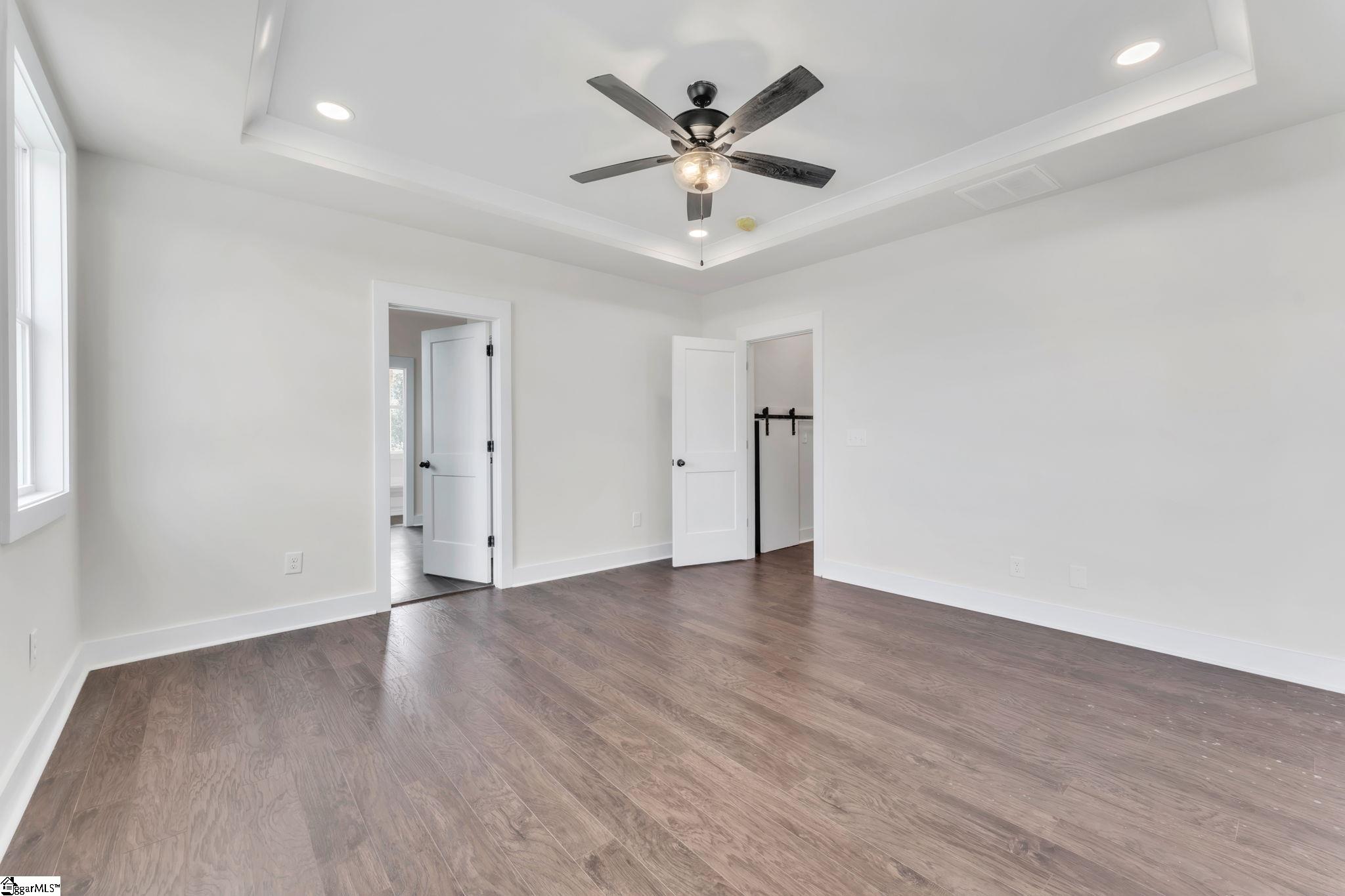 452 North Glassy Mountain Road Landrum, SC 29356 - Photo 30 of 46 lvp flooring, trey ceiling, access to back porch, valley views