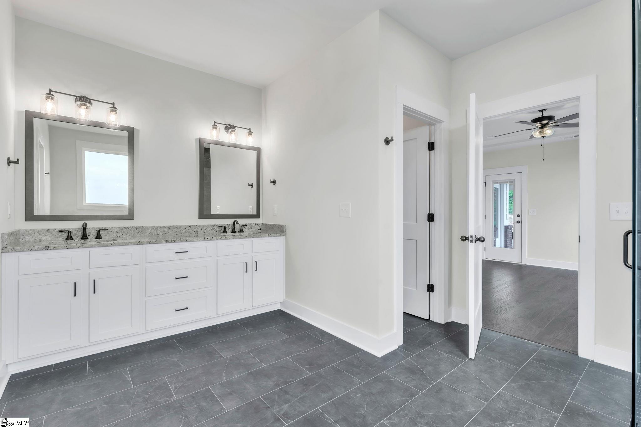 452 North Glassy Mountain Road Landrum, SC 29356 - Photo 31 of 46 double vanity, 2 sinks, 2 mirrors, private toilet