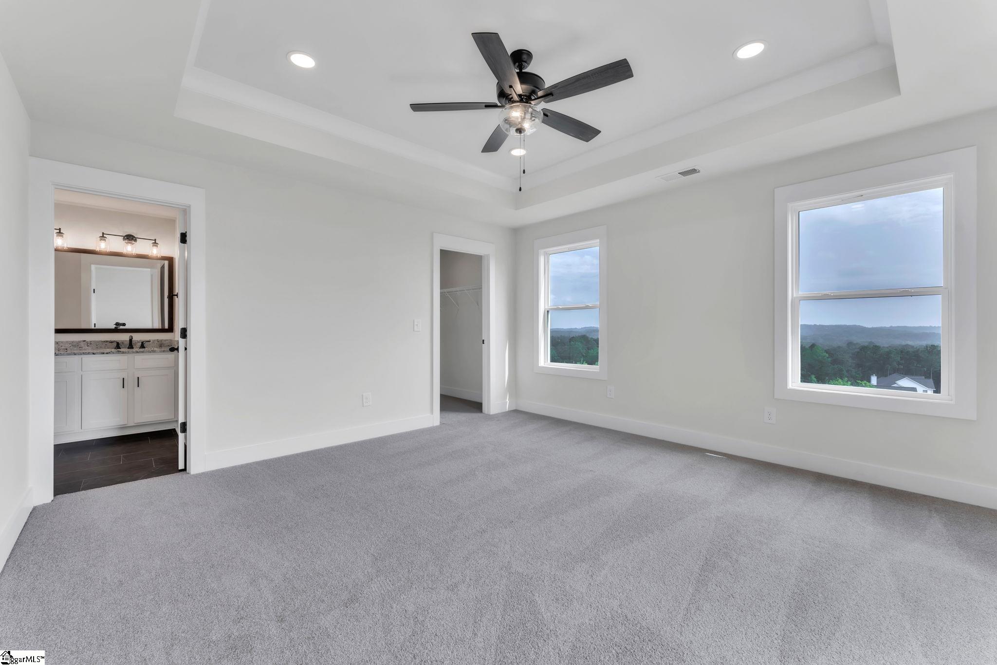 452 North Glassy Mountain Road Landrum, SC 29356 - Photo 41 of 46 mountain and valley views, trey ceiling, access to huge storage area, access to full bathroom