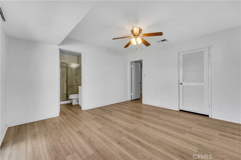 41852 Shain Lane Lancaster, CA 93536 - Photo 18 of 25 wooden floor in an empty room with a window
