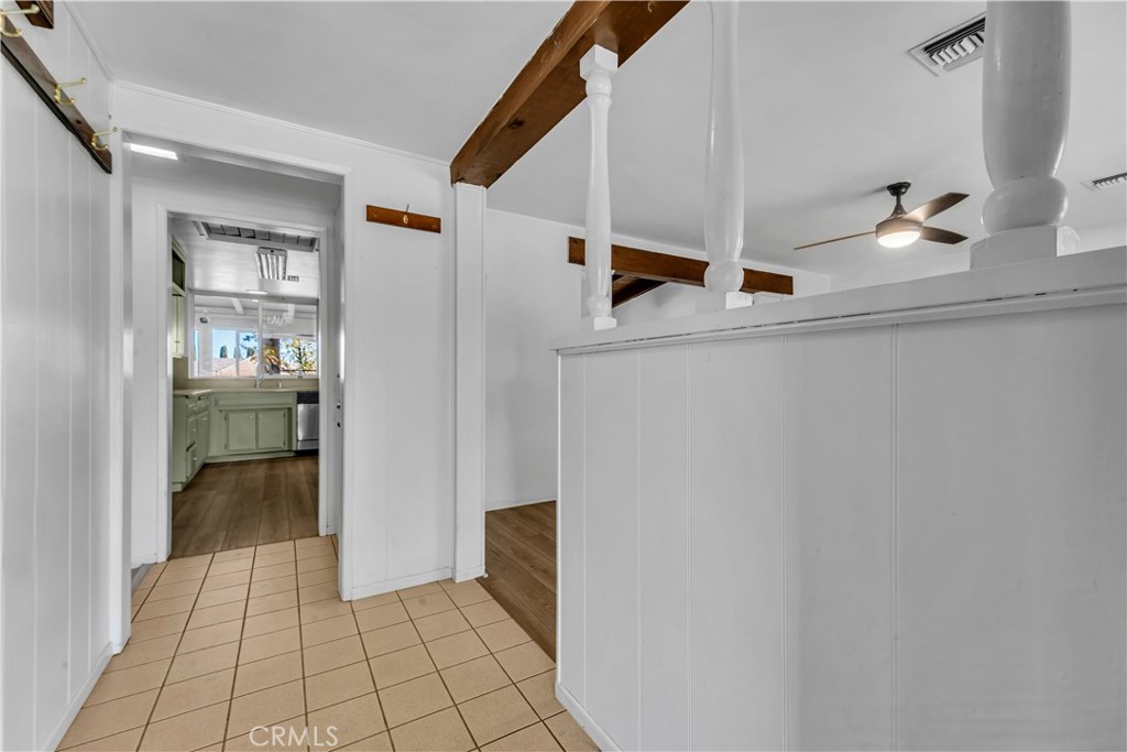 41852 Shain Lane Lancaster, CA 93536 - Photo 4 of 25 a kitchen with a refrigerator and a sink