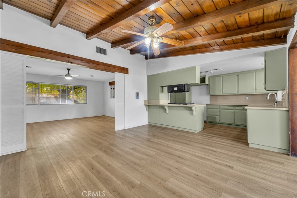 41852 Shain Lane Lancaster, CA 93536 - Photo 8 of 25 a view of kitchen with a sink and refrigerator