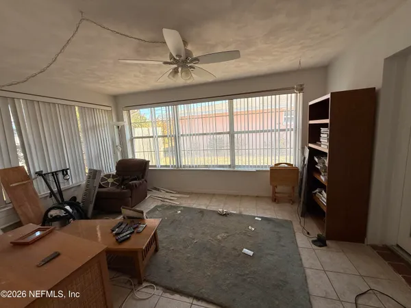 a workspace with furniture and a window