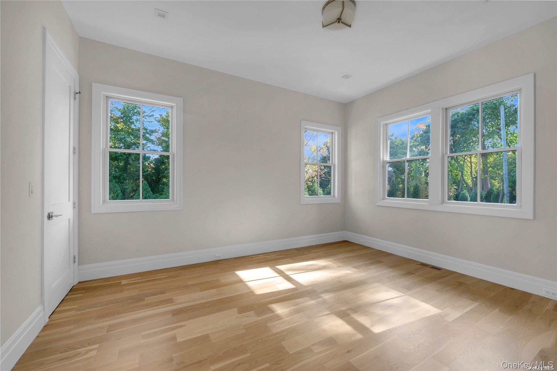 38 Cow Neck Road Sands Point, NY 11050 - Photo 16 of 48 a view of an empty room with a window