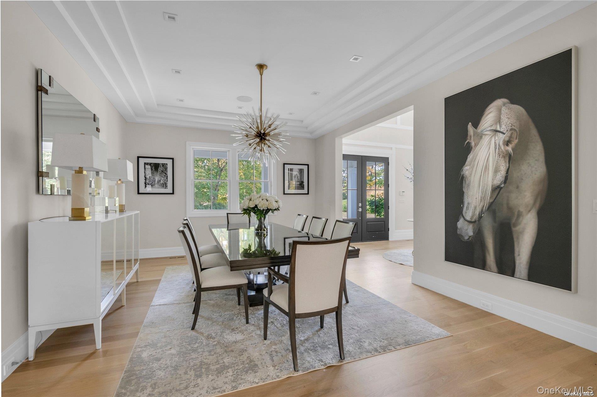 38 Cow Neck Road Sands Point, NY 11050 - Photo 6 of 48 a dining room with furniture and window