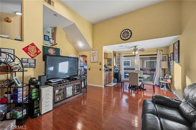 a view of a living room and dining room