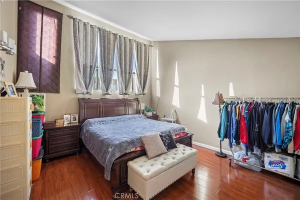 a bed room with a bed and a couch