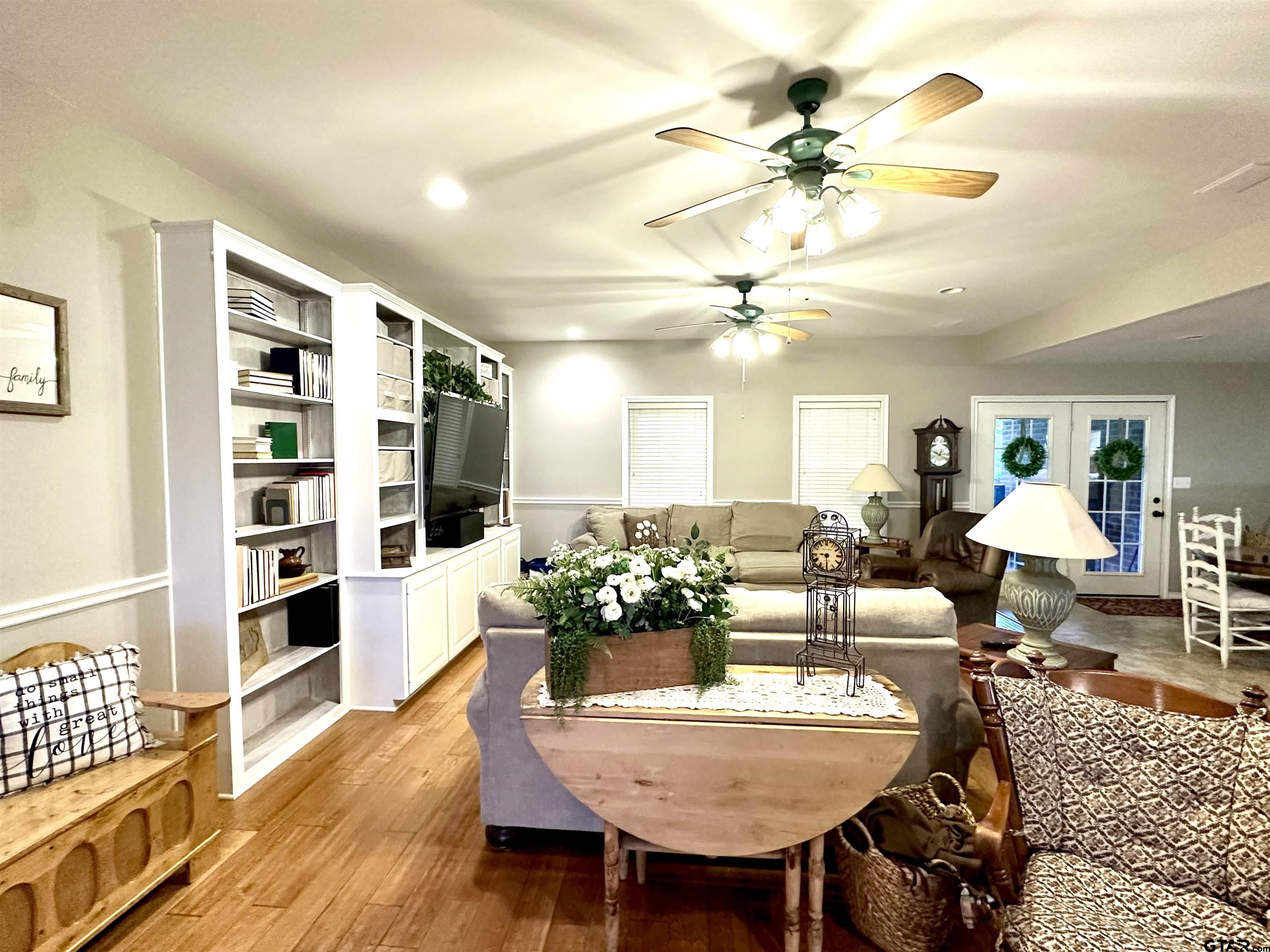 142 Parrish Rusk, TX 75785 - Photo 13 of 48 a dining room with furniture a rug and wooden floor