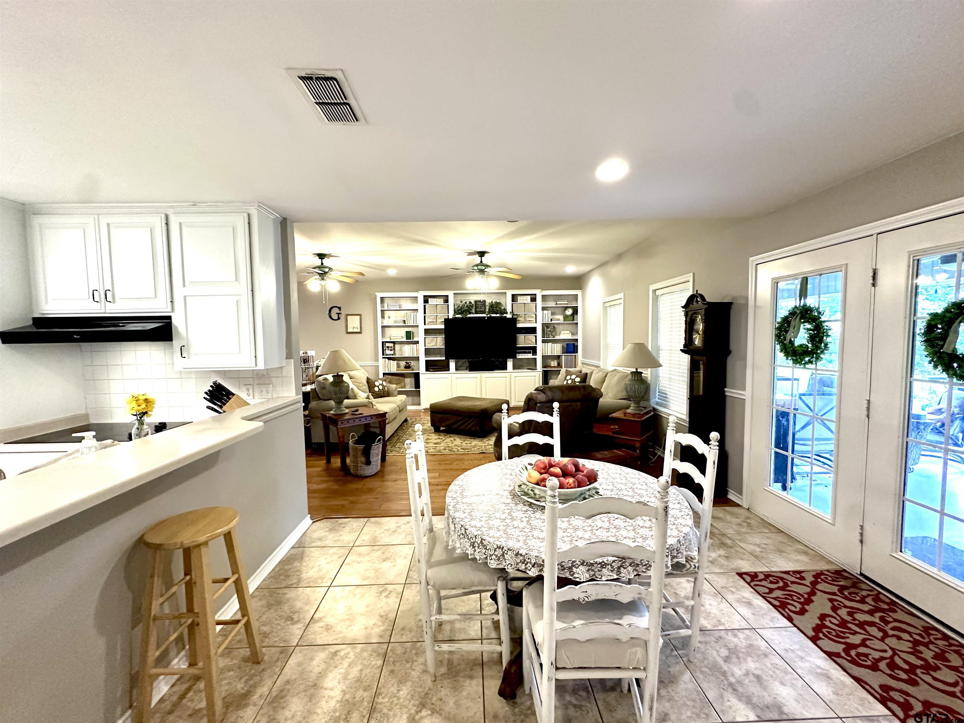 142 Parrish Rusk, TX 75785 - Photo 14 of 48 a kitchen with a sink a stove and cabinets