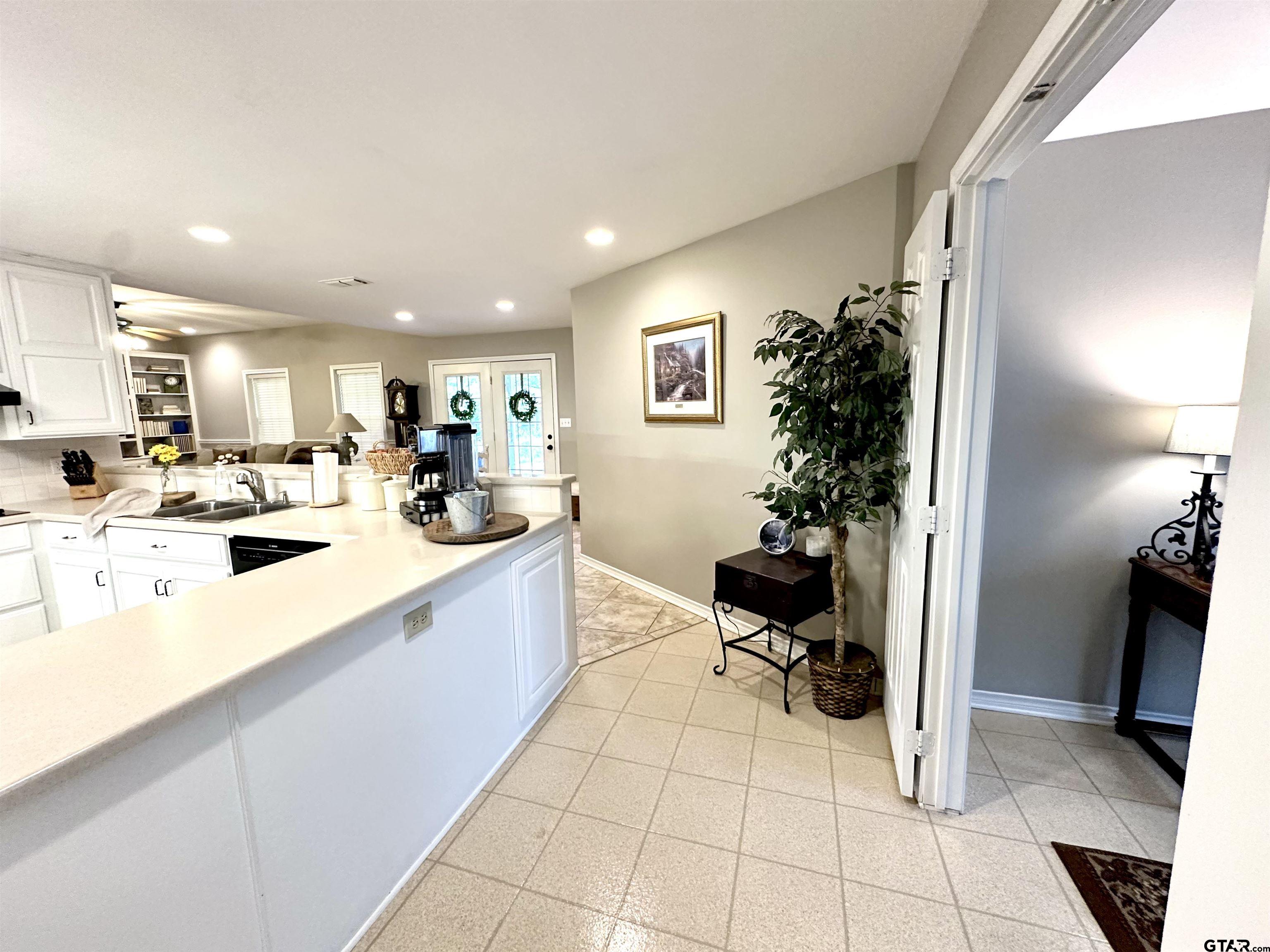 142 Parrish Rusk, TX 75785 - Photo 15 of 48 a kitchen with a sink appliances and cabinets