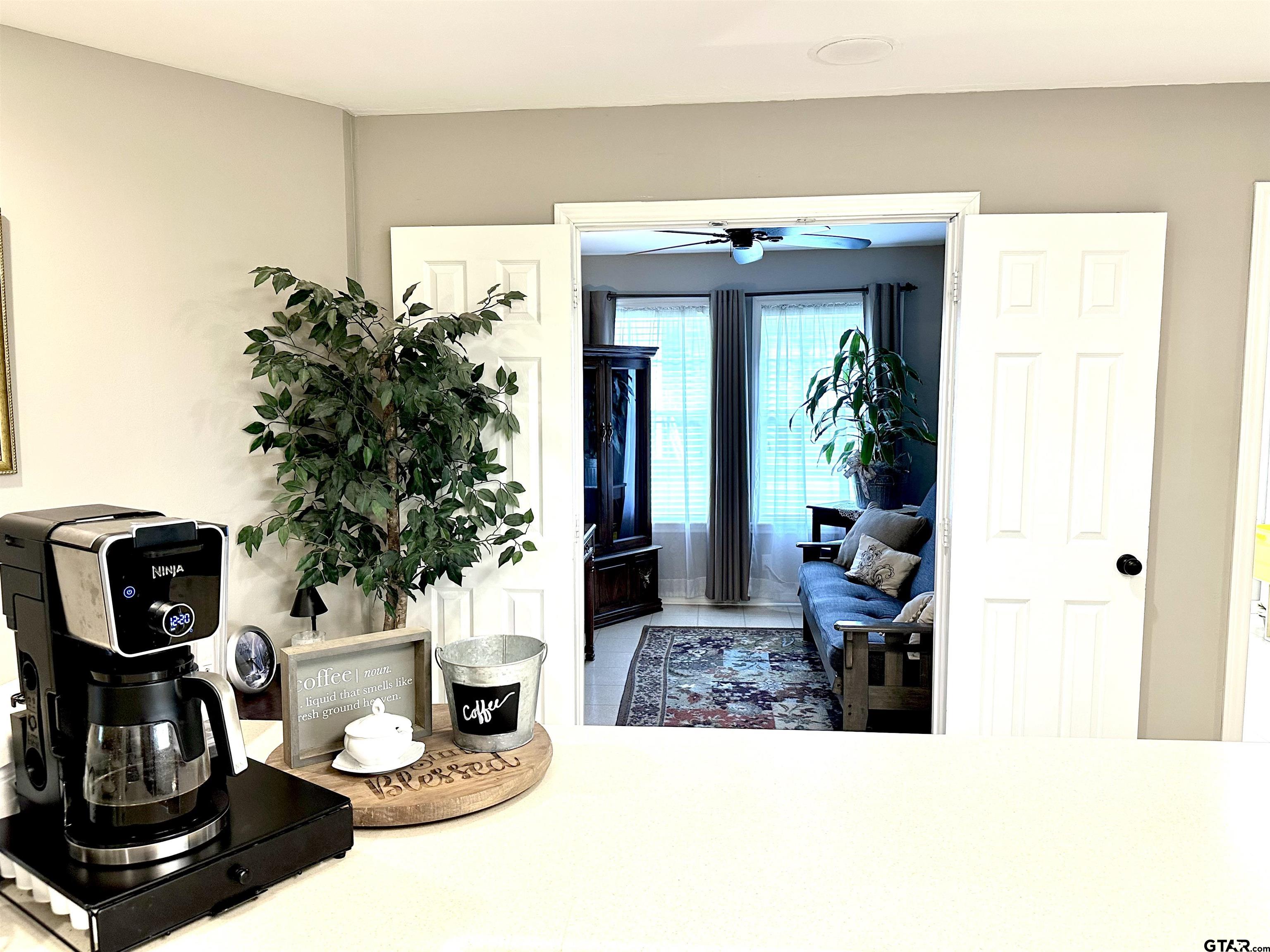 142 Parrish Rusk, TX 75785 - Photo 17 of 48 a living room with furniture and a potted plant